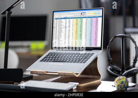Data Analyst Spreadsheet Software On Laptop Computer Stock Photo