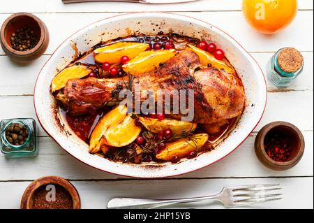 Turkey meat baked in oranges. Delicious roasted turkey leg Stock Photo