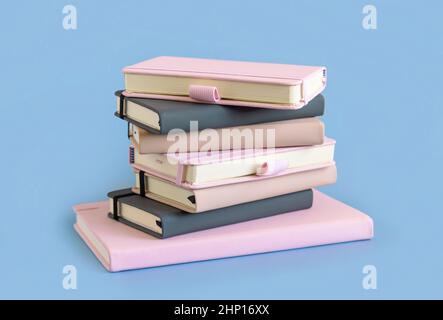 Stack of pink, beige and grey notebooks on light blue closeup. Textbook mockup. Educational, business and organizing concept Stock Photo