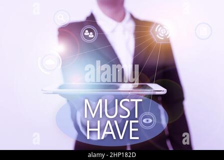 Sign displaying Must Have, Internet Concept something modern that many showing want to have Essential item Lady In Suit Presenting Mobile Device With Stock Photo