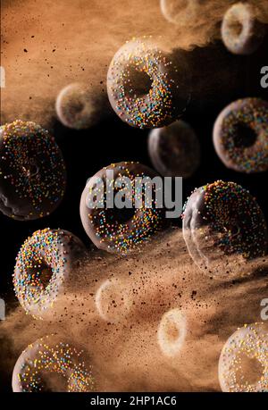 chocolate round donuts with multicolored sugar sprinkles levitate in a cloud of brown cocoa on a black background. Powder flies up Stock Photo