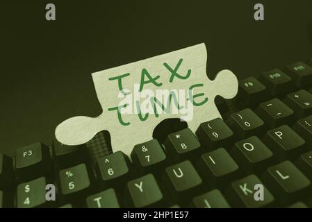 Sign displaying Tax Time, Business concept compulsory contribution state revenue levied government on workers Entering New Programming Codes, Typing E Stock Photo