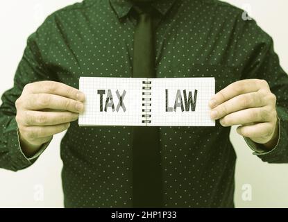 Text caption presenting Tax Law, Business concept governmental assessment upon property value or transactions Presenting New Plans And Ideas Demonstra Stock Photo