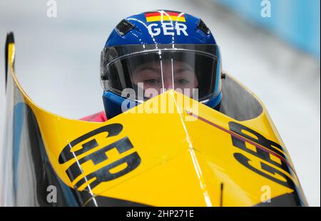 Yanqing, China. 18th Feb, 2022. Laura Nolte and Levi Deborah of Team Germany slide during the 2-women Bobsleigh heats at National Sliding Centre on Day Fourteen of Beijing 2022 Winter Olympic Games. Credit: Michael Kappeler/dpa/Alamy Live News Stock Photo