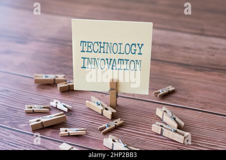 Conceptual display Technology Innovation, Internet Concept advanced net connected devices a Creative Technique Blank Square Note Surrounded By Laundry Stock Photo
