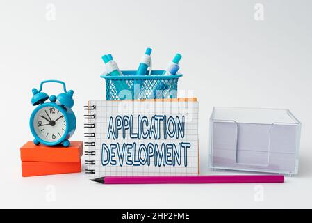 Inspiration showing sign Application Development, Business idea creation of Computer Apps for use on Mobile Devices Tidy Workspace Setup Writing Desk Stock Photo