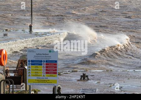 0900 Friday 18th February 2022. Storm Eunice: Lydney Harbour, Forest of Dean, River Severn, Gloucestershire. High tide and storm surge threaten to ove Stock Photo