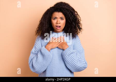 Photo of young woman afraid scared mistake trouble panic frightened isolated over beige color background Stock Photo