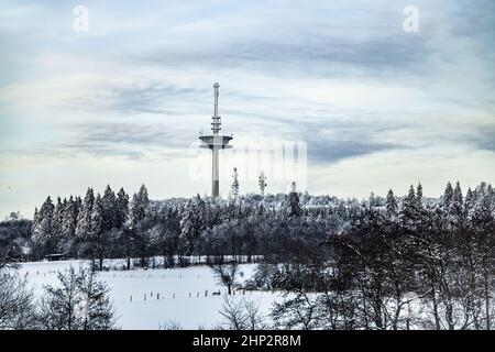 View to Hoherodskopf in beautiful landscape with snow in Hesse Germany Stock Photo