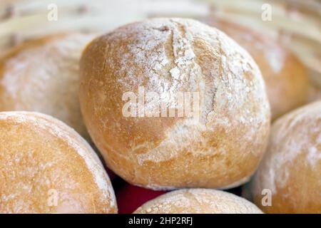 Home baked bread buns stacked in a pile Stock Photo