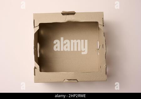 empty open box of brown cardboard, top view, concept of packing things Stock Photo
