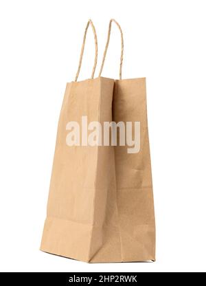 large disposable brown kraft paper bag with handles isolated on white background, eco packaging, zero waste Stock Photo