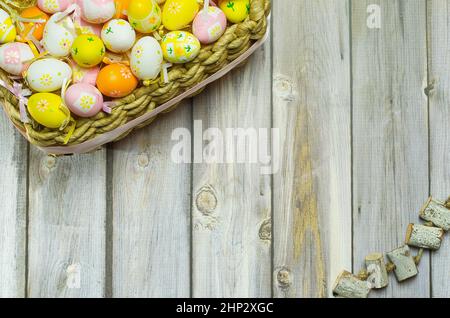 Easter egg basket colorful, hand painted. Easter background with space to write Stock Photo