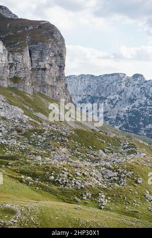 Stone mountain on the background of the ridge of the Sedlo Pass in the Durmitor National Park Stock Photo