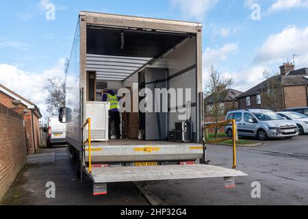 Electrical appliances in the back of a delivery van with, UK. White goods being transported and delivered. Stock Photo