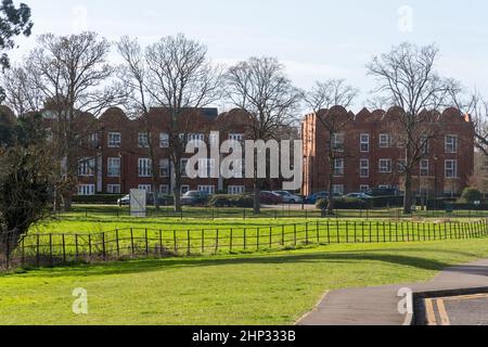 Gresham Mill in Old Woking, Surrey, England, UK, former mill and printing works now converted into apartments and houses, with Flemish style facade Stock Photo