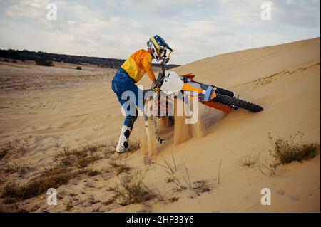 Motorbike accident and helmet falling on the ground isolated on white ...