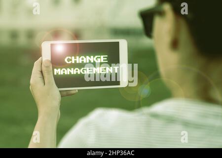 Hand writing sign Change Management, Business approach Replacement of leadership in an organization New Policies Voice And Video Calling Capabilities Stock Photo
