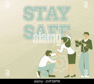 Text sign showing Stay Safe, Business overview secure from threat of danger, harm or place to keep articles Illustration Of A Group Holding Spur Gear Stock Photo