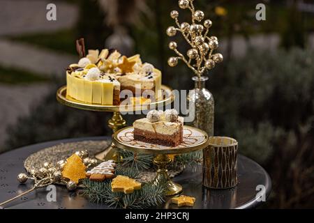 Still life of delicious three layered chocolate mousse cake decorated with coconut ball Stock Photo