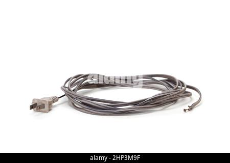 Old electricon power cord on white background with shadow Stock Photo