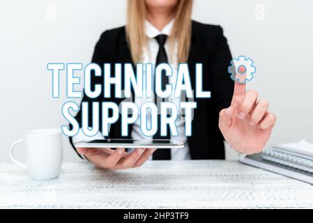 Hand writing sign Technical Support, Word for Repair and advice services to users of their products App Developer Presenting New Program, Displaying U Stock Photo