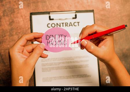 Hand writing sign Identity Hacking, Business idea criminal that steal your personal information using malware Writing New Ideas Telling Message And In Stock Photo