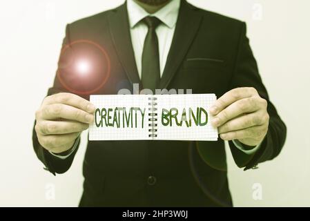 Writing displaying text Creativity Brand, Concept meaning design name or feature that distinguishes organization Presenting New Plans And Ideas Demons Stock Photo