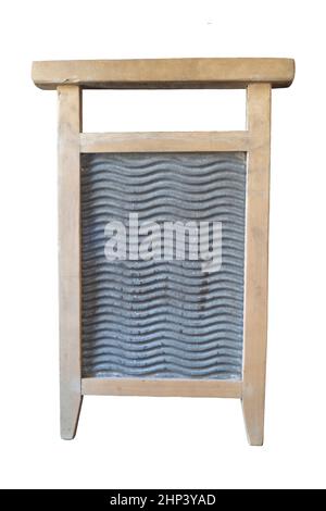 An old washing board isolated on a white background. Hand tool for washing clothes Stock Photo