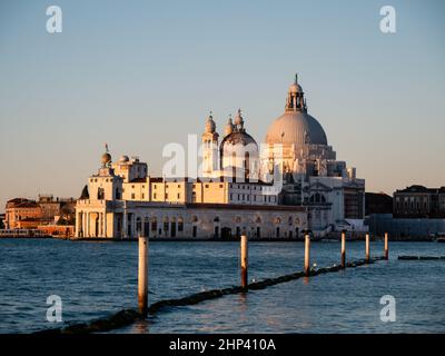 Punta della Dogana or Dogana da Mar and Ciesa Santa Maria Salute Church at Sunrise or Dawn in the Morning Stock Photo