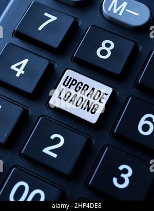 Text sign showing Upgrade Loading, Business overview advancement of applications to more improved tools Creating Data Entry And Typing Jobs, Posting O Stock Photo