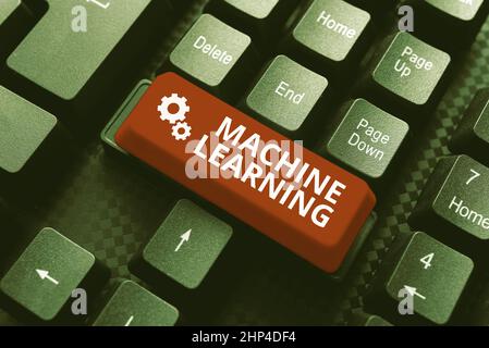 Conceptual caption Machine Learning, Business idea the concept that a computer can learn new data itself Typing Image Descriptions And Keywords, Enter Stock Photo