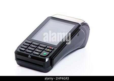 black payment terminal close-up for accepting money from plastic cards from customers on a white isolated background, copy space Stock Photo