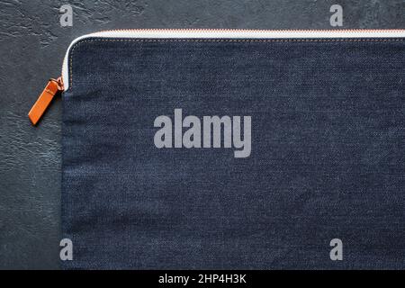 Close-up texture of a denim zippered laptop carrying case Stock Photo