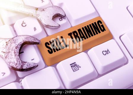 Hand writing sign Skill Training, Business concept designed to gain and enhance the knowledge an employee needs Writing Interesting Online Topics, Typ Stock Photo