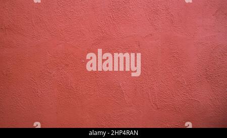 Abstract background from  red stucco concrete wall with sunlight, light and shadow Stock Photo