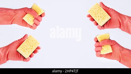 Hands in rubber gloves with yellow cleaning sponges on white background Stock Photo