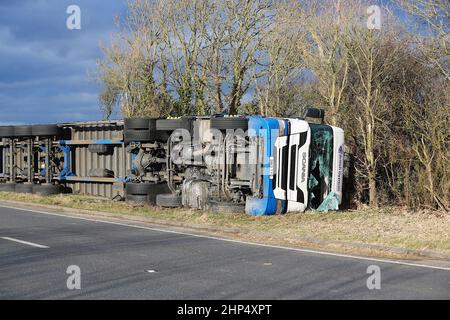 Ashford, Kent, UK. 18 Feb, 2022. UK Weather: Storm Eunice has toppled a British Gypsum lorry on the A259 near Hamstreet in Ashford, Kent. Overturned lorry. Photo Credit: Paul Lawrenson-PAL News /Alamy Live News Stock Photo