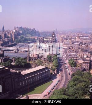 1960s, historical view from this era, from above over Princes Street and Edinburgh Castle, from Carlton Hill, Edinburgh, Scotland, UK. One of the city's main hills, the views from the top over the city skyline are spectaular. Stock Photo