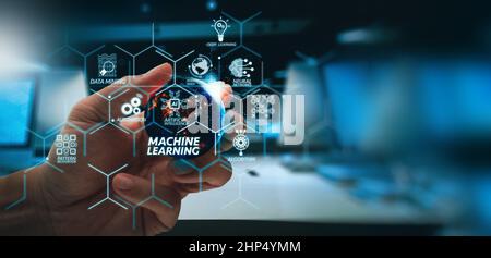 Machine learning technology diagram with artificial intelligence (AI),neural network,automation,data mining in VR screen.hand showing the earth.Elemen Stock Photo
