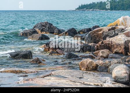 Rocky promontory in Superior Lake Park. Canada Stock Photo