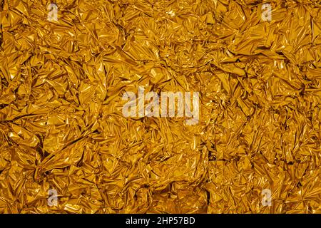 Crumpled gold foil background Stock Photo