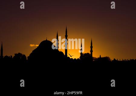 Mosque background. Silhouette of Suleymaniye Mosque at sunset. Ramadan or kandil or laylat al-qadr or kadir gecesi or islamic background photo. Select Stock Photo
