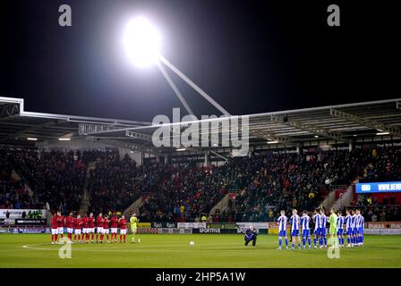 Players take part in a minute's applause in memory of former Rotherham United player Roy Lambert, ahead of the Sky Bet League One match at the AESSEAL New York Stadium, Rotherham. Picture date: Friday February 18, 2022. Stock Photo