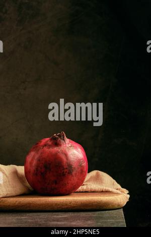 ripe pomegranate on the table Stock Photo