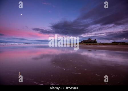 Evening on the beach at Bamburgh Castle on the coast,Northumberland, north east England. Stock Photo