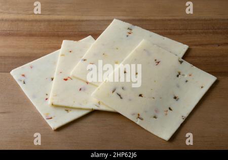 Pepperjack Cheese Slices Stock Photo