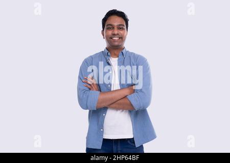 Indian Man Hands Crossed Standing Isolated Serious Face. Man Posing Stock Photo