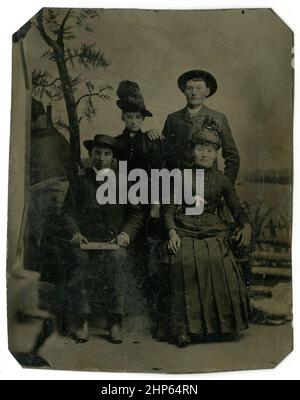 Antique circa 1860 tintype photograph, two couples. Location unknown, USA. SOURCE: ORIGINAL TINTYPE Stock Photo