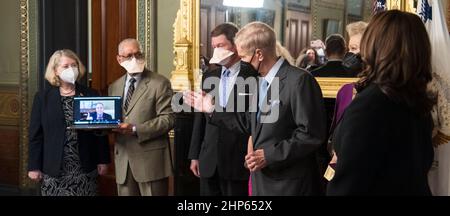 Former Senator Bill Nelson, speaks to media after he was ceremonially sworn-in as the 14th NASA Administrator by Vice President Kamala Harris, as his wife, Grace Nelson, held their family Bible, Monday, May 3, 2021, at the Ceremonial Office in the Old Executive Office Building in Washington. Former NASA Administrators Jim Bridenstine (virtually on laptop) and Charles Bolden, second from left, as well as Pam Melroy, current nominee for NASA Deputy Administrator, left, were also present. Stock Photo